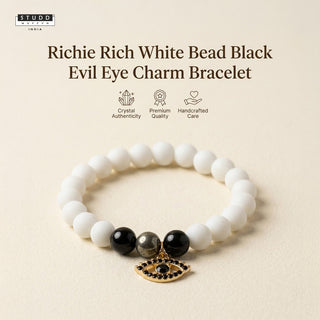 Richie Rich White Bead Black Evil Eye Charm Bracelet