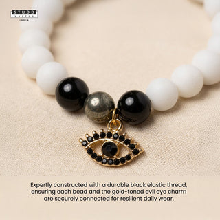Richie Rich White Bead Black Evil Eye Charm Bracelet