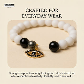 Richie Rich White Bead Black Evil Eye Charm Bracelet