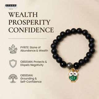 Richie Rich Black Bead Green Owl Charm Bracelet