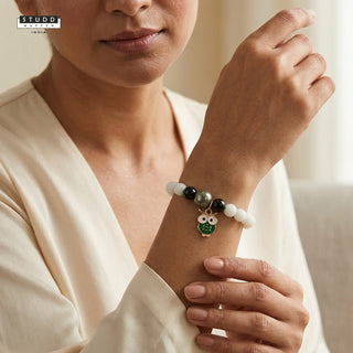 Richie Rich White Bead Green Owl Charm Bracelet