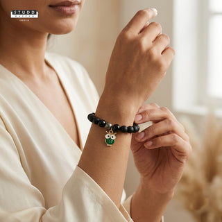 Richie Rich Black Bead Green Owl Charm Bracelet