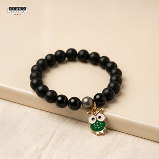 Richie Rich Black Bead Green Owl Charm Bracelet