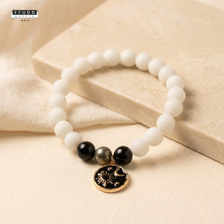 Richie Rich White Bead Galaxy Charm Bracelet