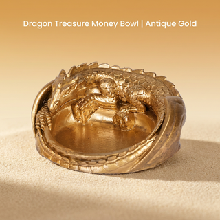 Antique gold Dragon Treasure Money Bowl handcrafted in resin on a warm premium backdrop