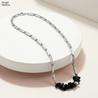 Alchemy Obsidian Rice Chain Pendant draped on a bright premium set