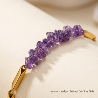 Close-up of natural amethyst chips set into polished gold rice links