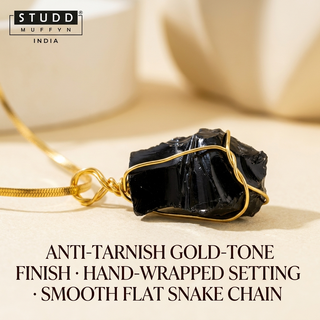 Macro close-up of the gold-tone snake chain and wire wrap showing quality finish