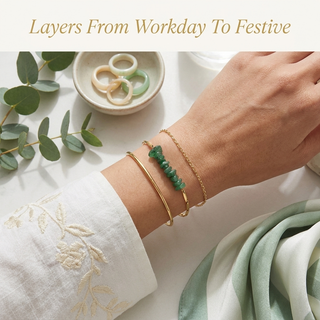 Green Aventurine bracelet styled and layered with minimal golden jewellery on a woman