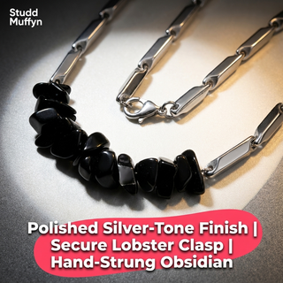 Macro craftsmanship proof of the polished silver rice links and hand-strung obsidian