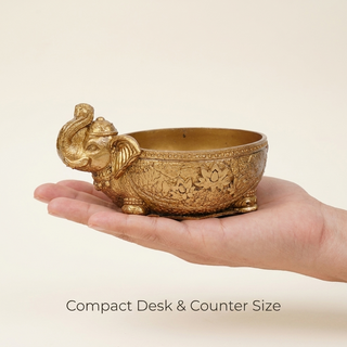Gajraj money bowl shown in hand to indicate its compact size