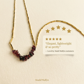 Social proof card with a five-star rating and the Garnet rice chain necklace