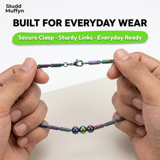Prism Hematite Rice Chain held taut to show secure links and clasp