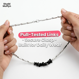 Silver rice chain held taut to show strong secure links
