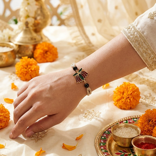 Divine Lotus Obsidian Crystal Rakhi