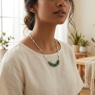 Woman wearing the Green Aventurine crystal rice chain necklace